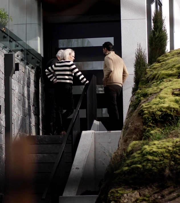 people viewing a luxury home